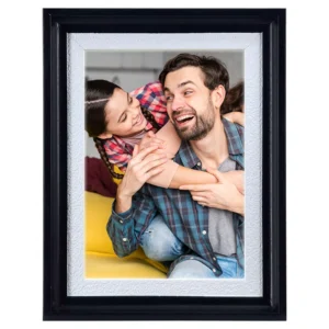 Photo frame with real glass, PVC frame, slightly textured white inner border, and black outer border, suitable for 4x6 or 5x7 inch photos.